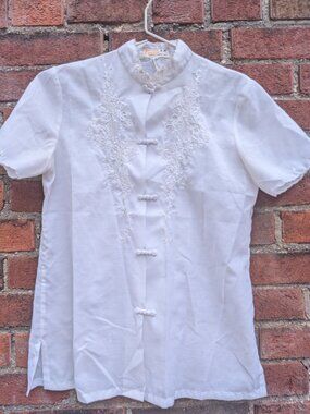 White Chinese shirt.